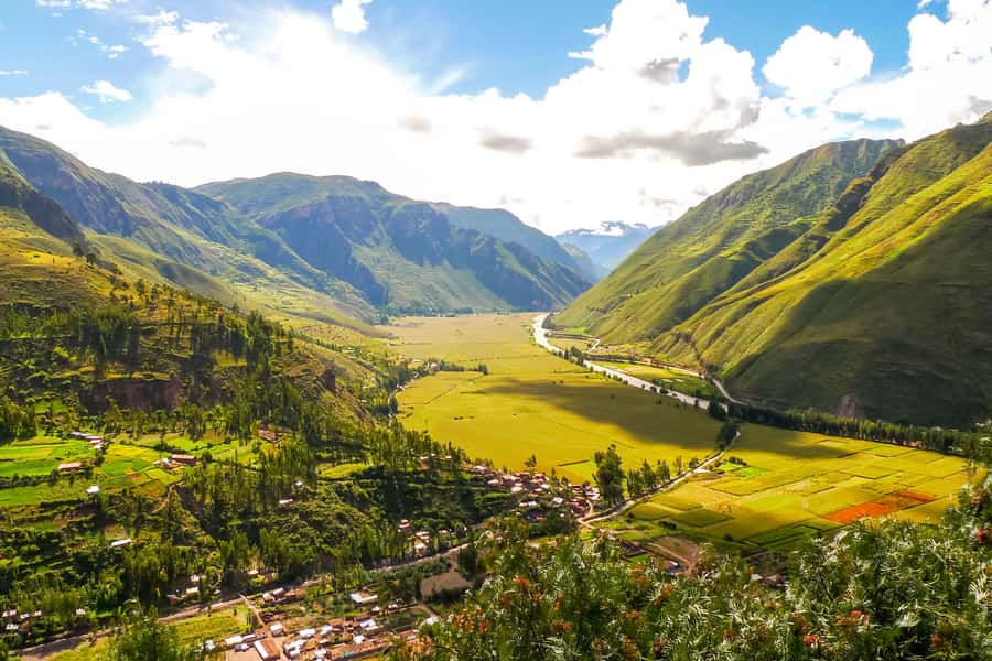 Cusco: Full-Day Sacred Valley History Tour - Pisac market and hillside ruins