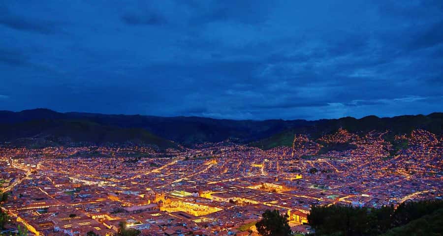 Cusco: Legends and History Night Tour with Pisco Sour - San Cristobal and the change from view to street