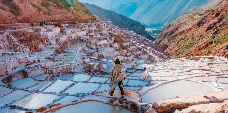 Cusco: Maras Salt Mines & Inca Moray Half Day Trip - Maras Salt Mines turn mountain water into salt