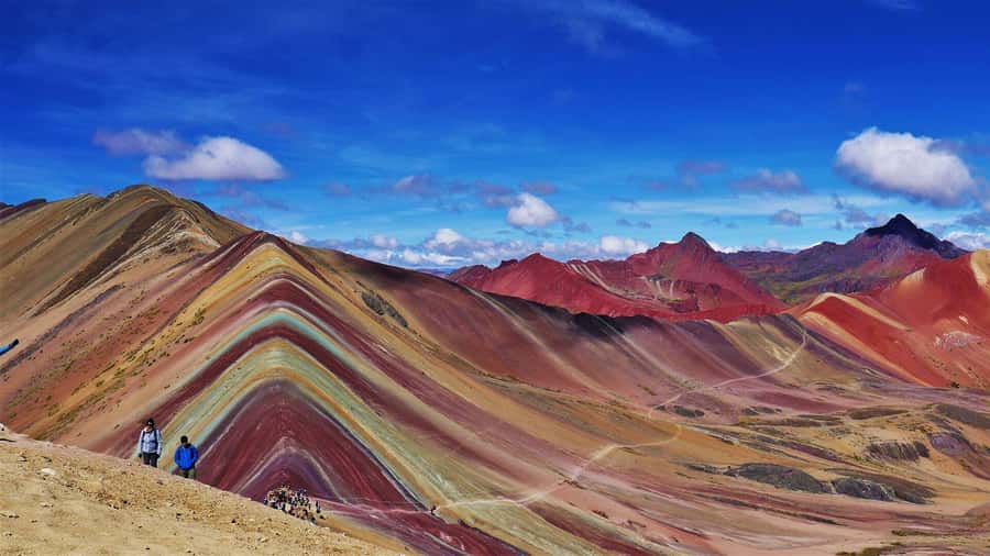 Cusco: Rainbow Mountain Tour with Meals & Red Valley Option - The climb at 5,200 meters