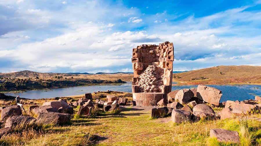 Discover the Celestial Wonder of Sillustani: Towers of Time - Waruwaru farming mounds beyond the tombs