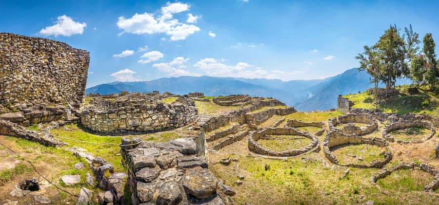 From Chachapoyas: Kuelap Fortress and Cable Car Tour - Circular Buildings and Narrow Passageways