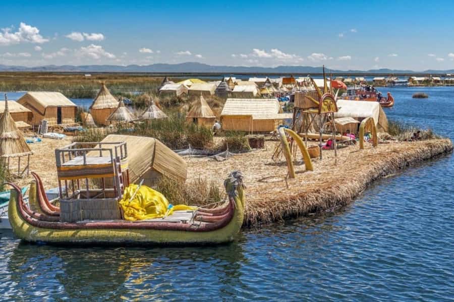 From Puno: Uros and Taquile Islands Full-Day Tour - Meeting the reed-built Uros islands