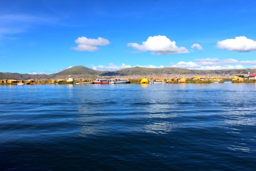 From Puno: Uros floating islands half Day tour - The handmade boat option