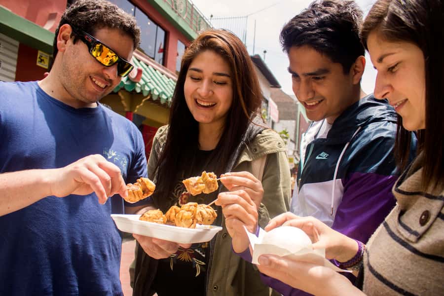 Lima: Flavors and Tradition Walking Tour with Food Tasting - Papa a la huancaina, churros, and a Pisco Sour