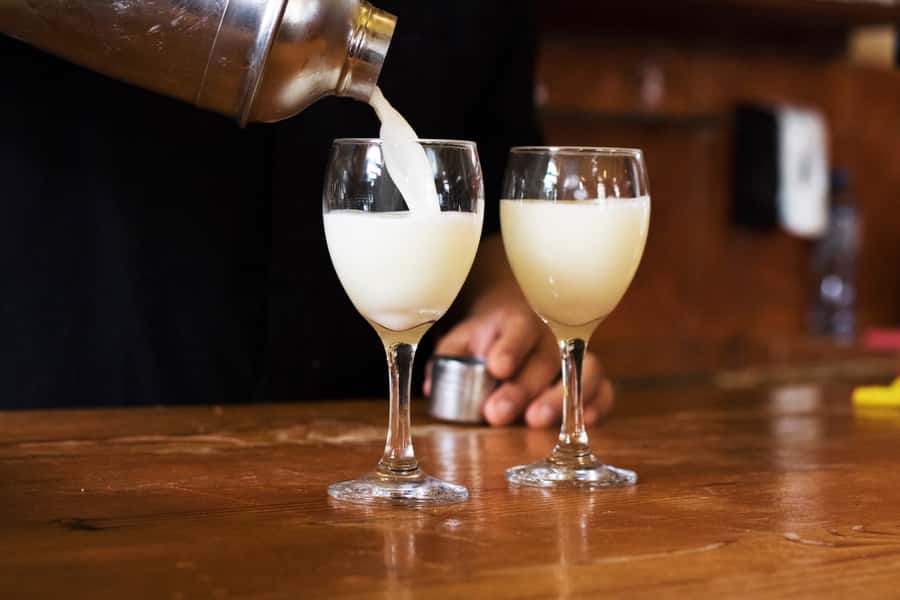 Lima: Flavors and Tradition Walking Tour with Food Tasting - Cordano Tavern near Government Palace