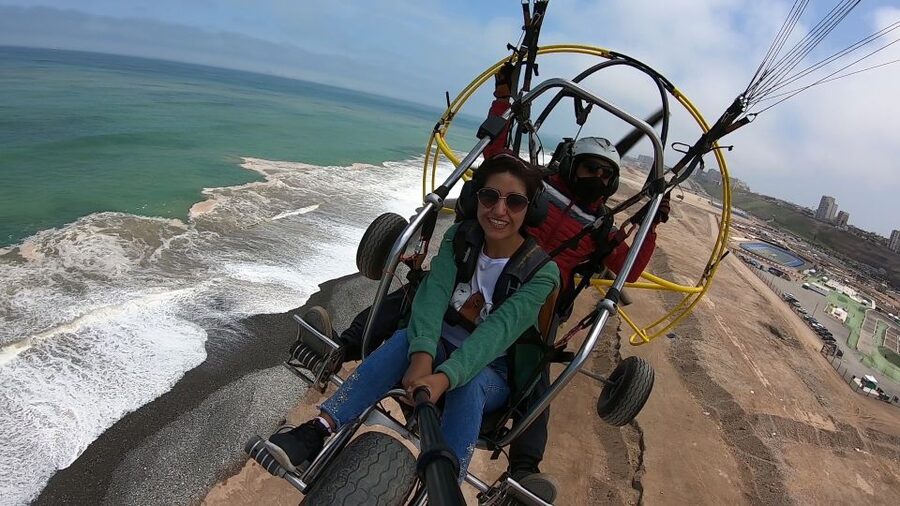 Lima: Paragliding Flight Over Costa Verde Districts - San Isidro’s towers, parks, and city detail