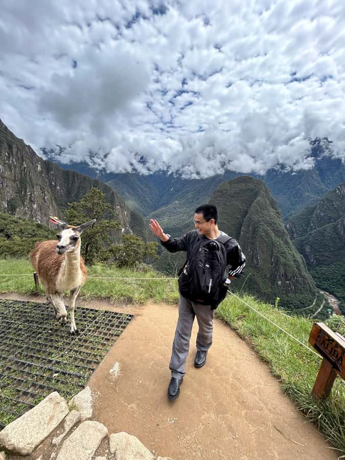 Machu Picchu: Private Tour Guide Service for up to 15 people - Sacred Rock and the meaning of scale