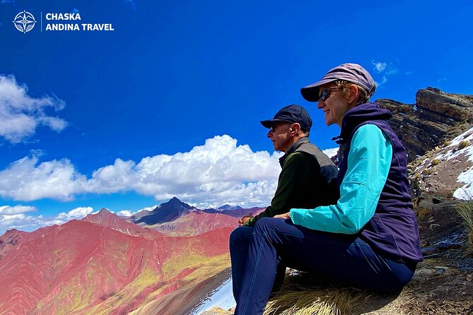 Private Tour Rainbow Mountain + Red Valley + LUNCH - Walking through Pitumarca’s red hills