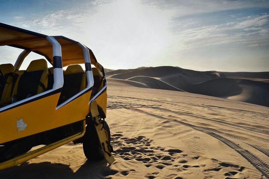 Pro Sanboarding or skiing in Huacachina from Lima - Day trip - Getting fitted for sandboarding and sand skiing