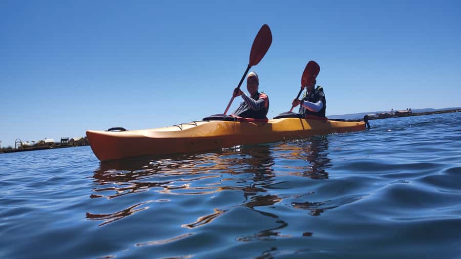 Puno: 2-day Uros Kayak Tour with Homestay at Amantani Island - Crossing to Amantani for a family stay
