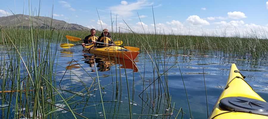 Puno: 2-day Uros Kayak Tour with Homestay at Amantani Island - Paddling toward the Uros floating islands