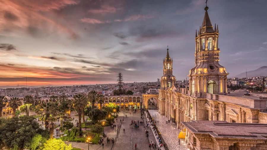 Walking tour through the Historic Center of Arequipa - Cross the Bolognesi Bridge for volcano views