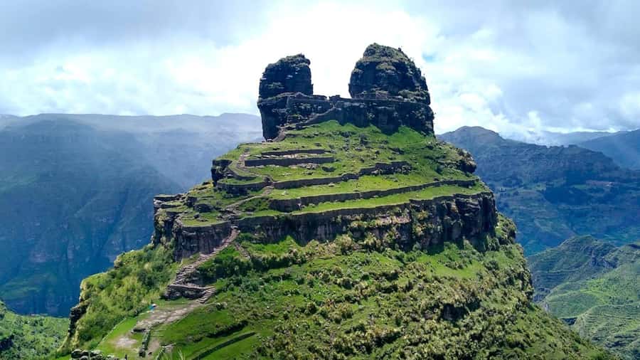 "Waqra Pucara, The Majestic Fortress Revealing Secrets of the Andes". - Pomacanchi Lagoon and the changing Andean views